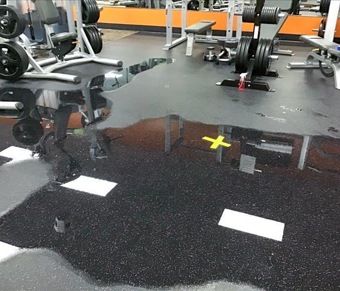 Water on the floor of a gym in Enumclaw, WA
