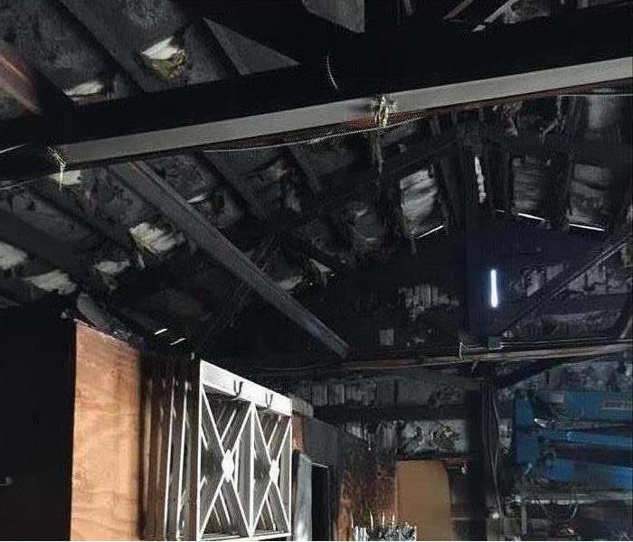 Ceiling fire damaged in a home in Puyallup, WA.